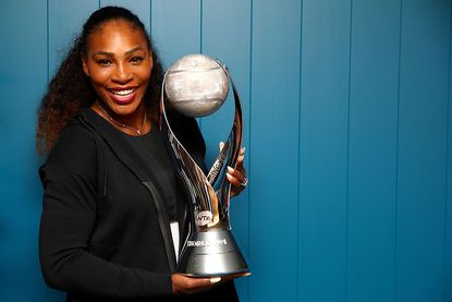 Serena Williams of the United States poses with the WTA world No.1 trophy