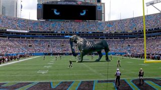 The Carolina Panthers panther projects onto the field via mixed reality. 