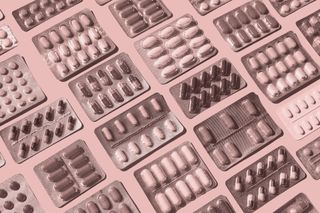 An array of blister packs filled with pills