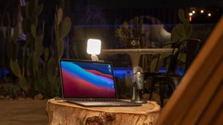 The Logitech Litra Glow on a laptop outside in the dark