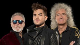 Queen and Adam Lambert posing for a photograph in 2014