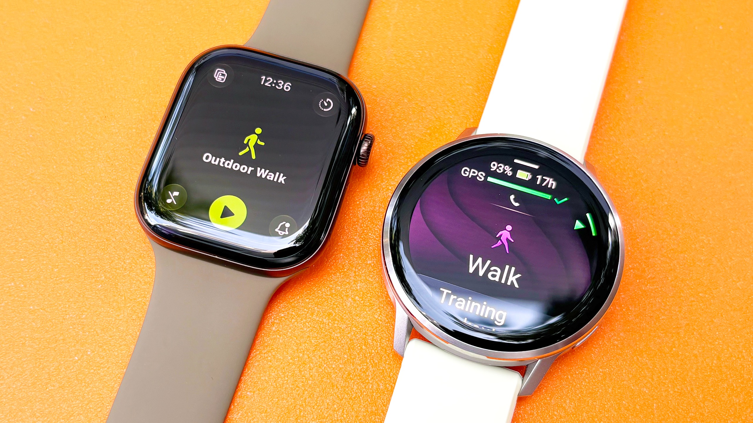 Close-up of the Apple Watch Series 12 next to the Garmin Venu 4