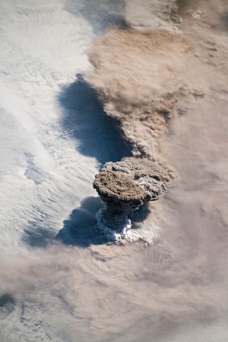 An astronaut's photo of the Raikoke volcano erupting on June 22, 2019.