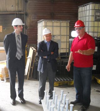 Alexander J. Moseson (left) and Michel W. Barsoum (center) visit a precast concrete plant.
