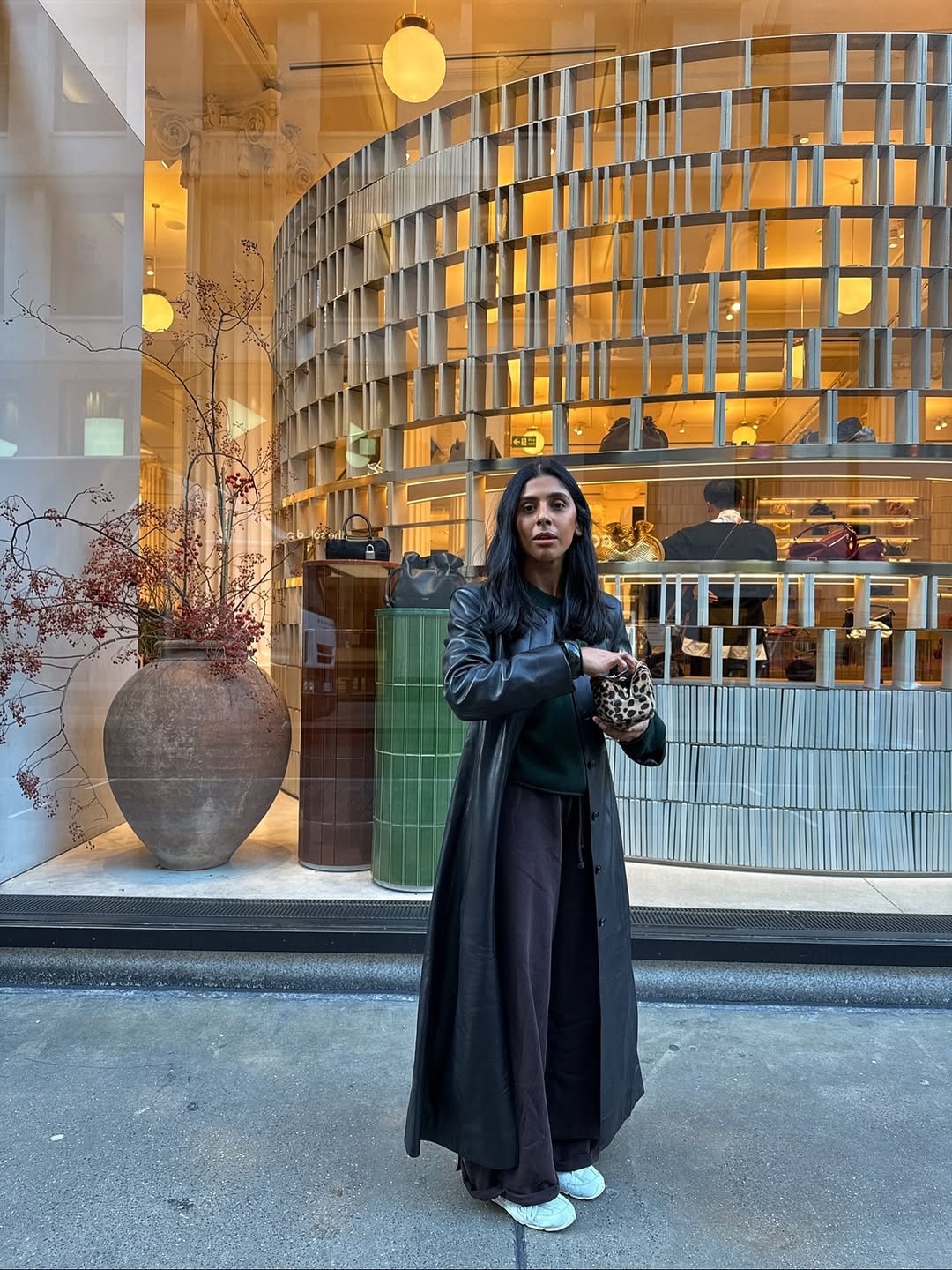 Influencer Monikh wearing a pair of white trainers