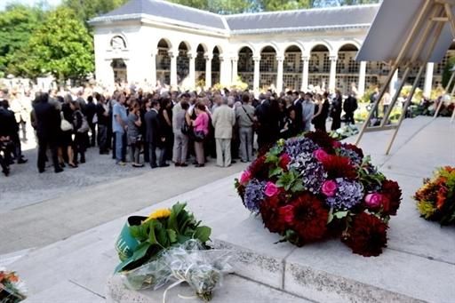 Relatives and friends attend the funeral ceremony for French cycling champion Laurent Fignon at the Pere Lachaise crematorium in Paris.