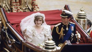 london, england july 29 prince charles, prince of wales and diana, princess of wales, wearing a wedding dress designed by david and elizabeth emanuel and the spencer family tiara, ride in an open carriage, from st pauls cathedral to buckingham palace, following their wedding on july 29, 1981 in london, england photo by anwar husseinwireimage