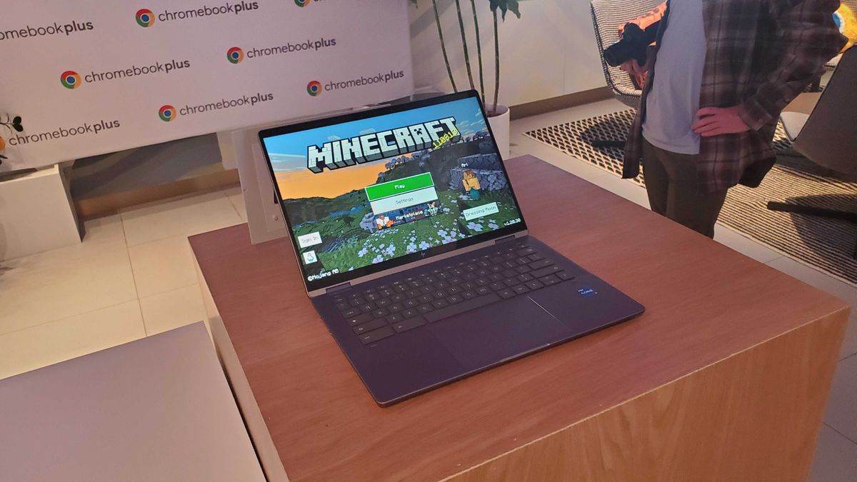 Chromebook Plus laptop on wooden table