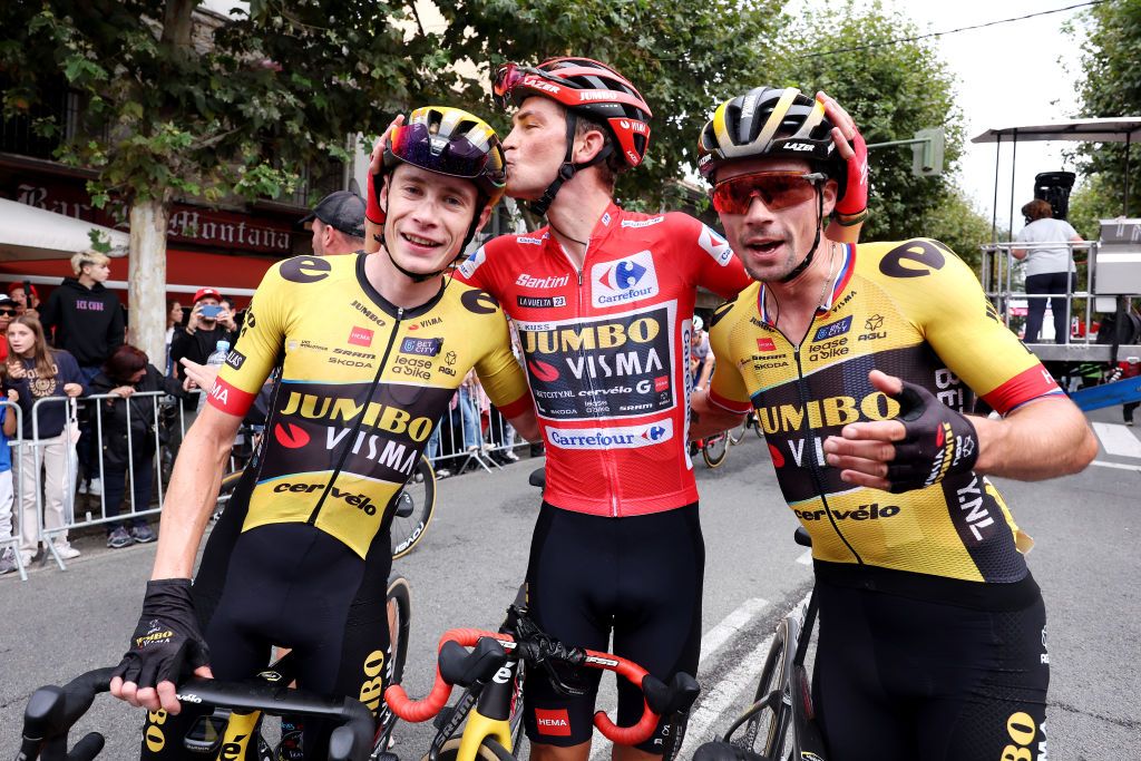 GUADARRAMA SPAIN SEPTEMBER 16 LR Jonas Vingegaard of Denmark Sepp Kuss of The United States Red Leader Jersey final overall winner and Primo Roglic of Slovenia and Team JumboVisma celebrate the victory during the 78th Tour of Spain 2023 Stage 20 a 2078km stage from Manzanares El Real to Guadarrama UCIWT on September 16 2023 in Guadarrama Spain Photo by Alexander HassensteinGetty Images