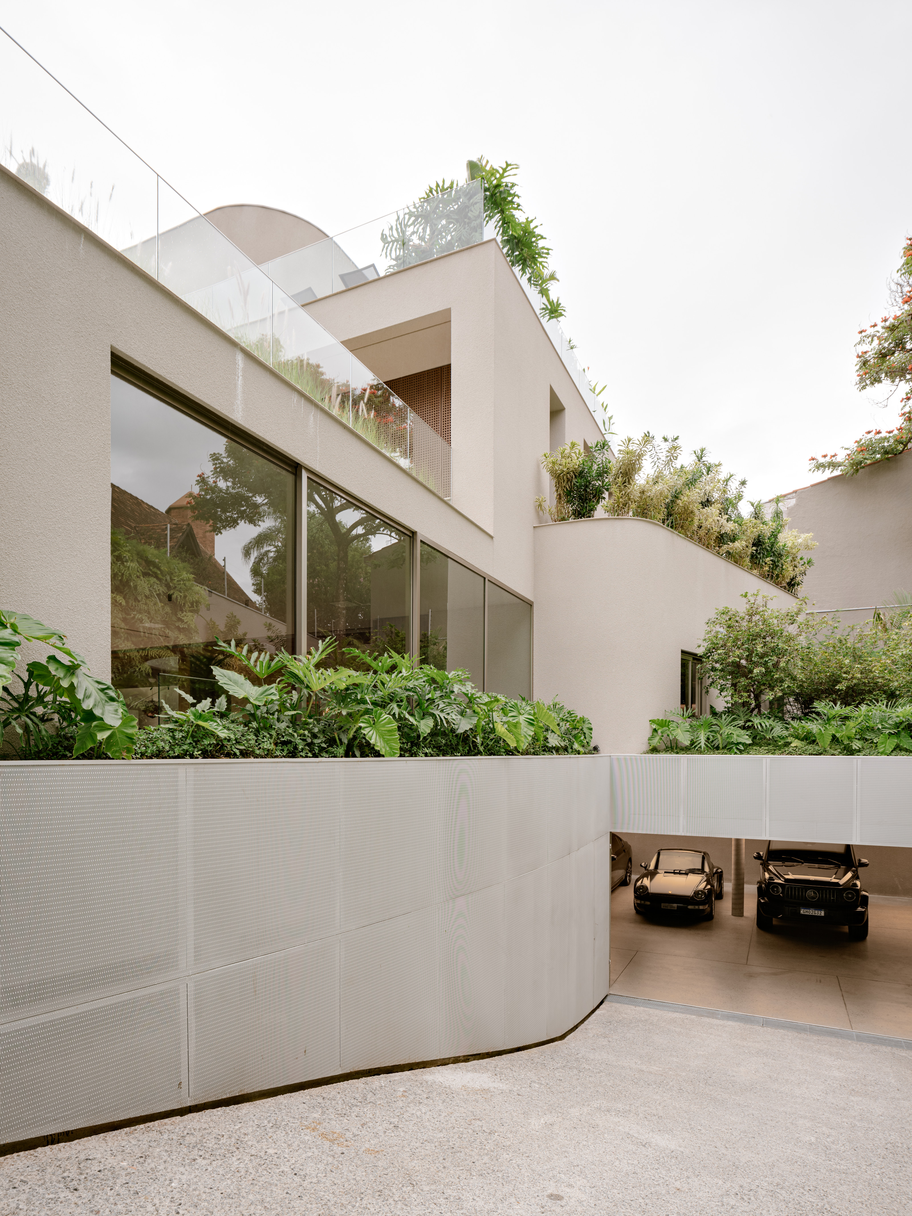 A ramp leads down to the basement garage