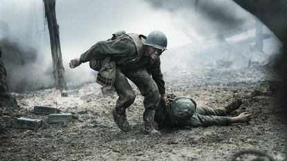 Desmond Doss drags a soldier on the battlefield in Hacksaw Ridge.