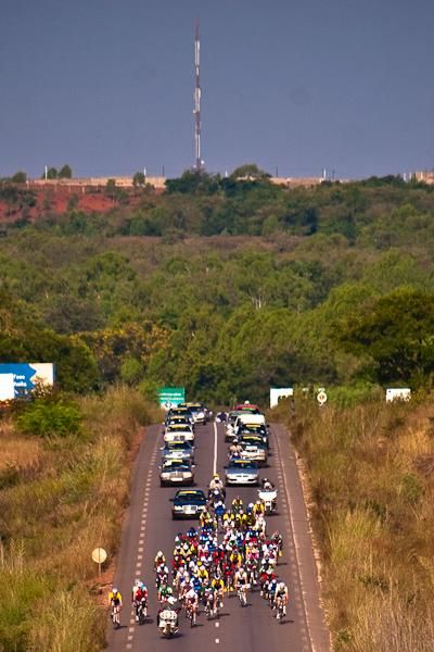 The peloton enters the rolling hills outside of Bobo-Dioulasso.