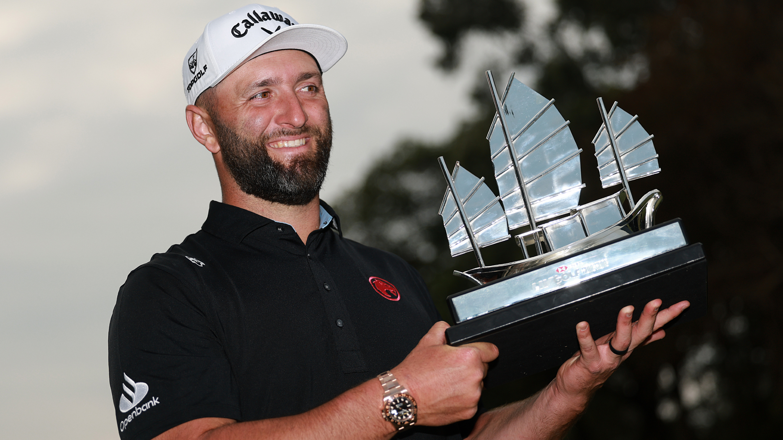 Jon Rahm with a LIV Golf trophy