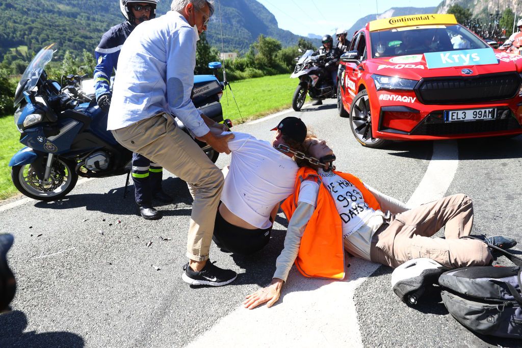MEGEVE FRANCE JULY 12 Protesters in defending Mont Blanc environment block the route during the 109th Tour de France 2022 Stage 10 a 1481km stage from Morzine to Megve 1435m TDF2022 WorldTour on July 12 2022 in Megeve France Photo by Michael SteeleGetty Images