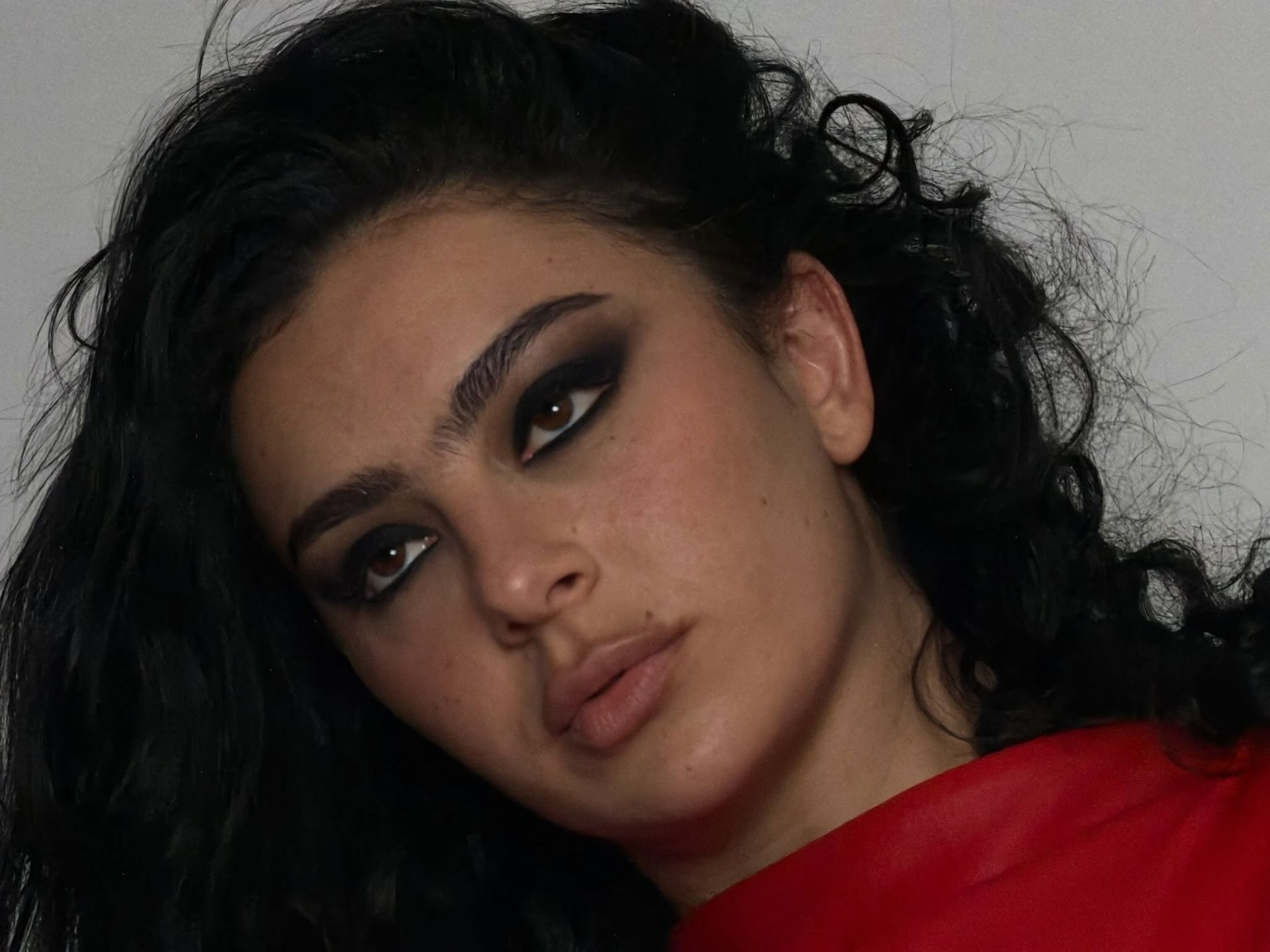 Charli XCX with deep smoky eyes