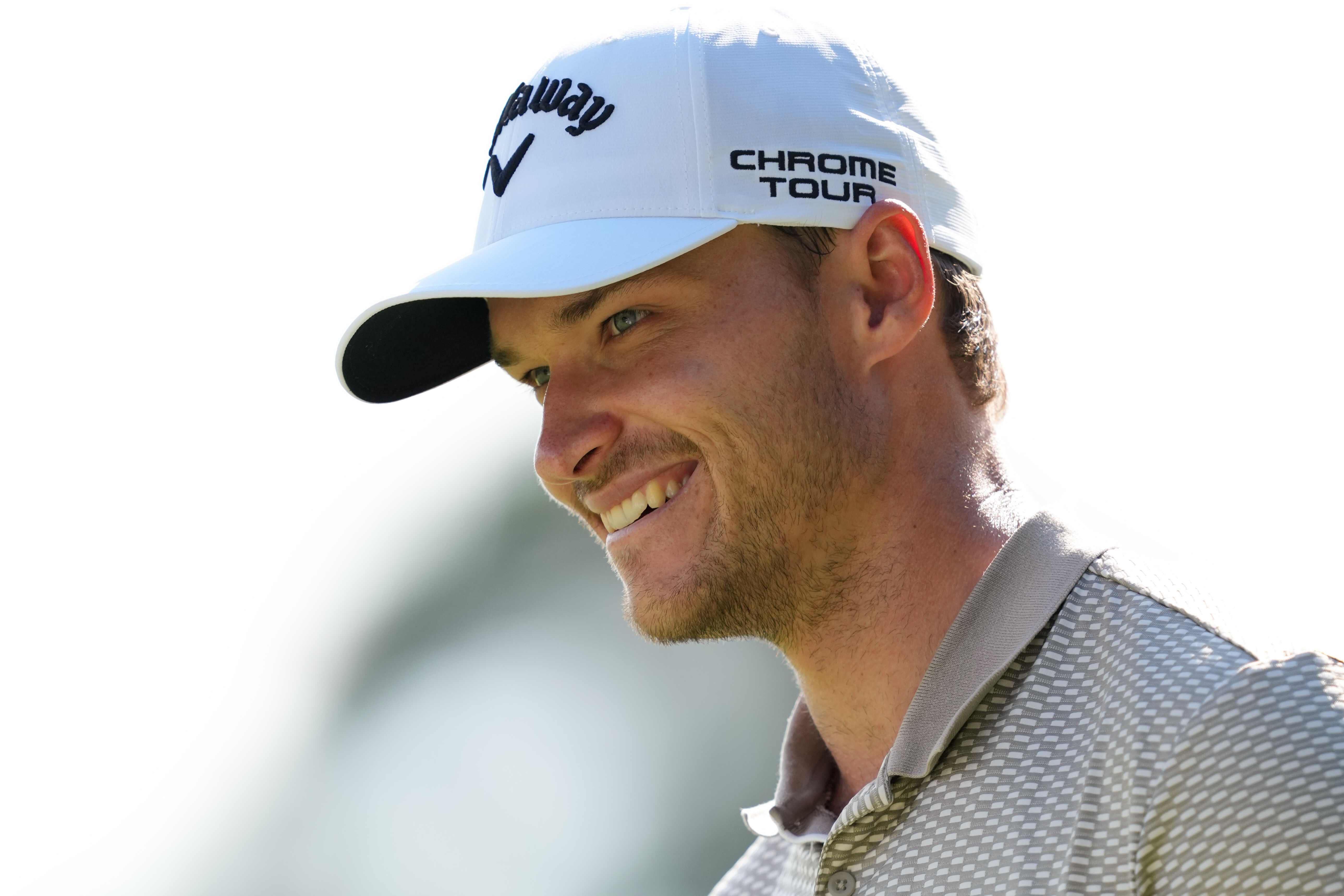 Rasmus Hojgaard smiles during a practice session ahead of the 2025 Sanderson Farms Championship