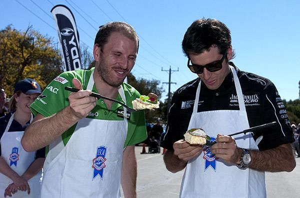 V8 Supercar drivers Paul Dumbrell (left) and Rick Kelly admire their good work during the Great Vanilla Slice Triumph day in Ouyen prior to stage eleven of the tour.