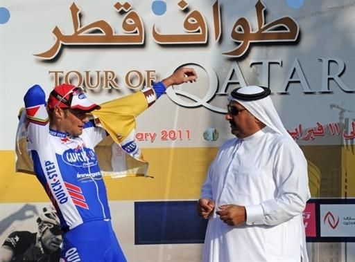 Tom Boonen (Quick Step) pulls on the leaders jersey after a winning spring