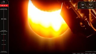 closeup photo of a rocket engine firing in space, its nozzle glowing yellow-orange