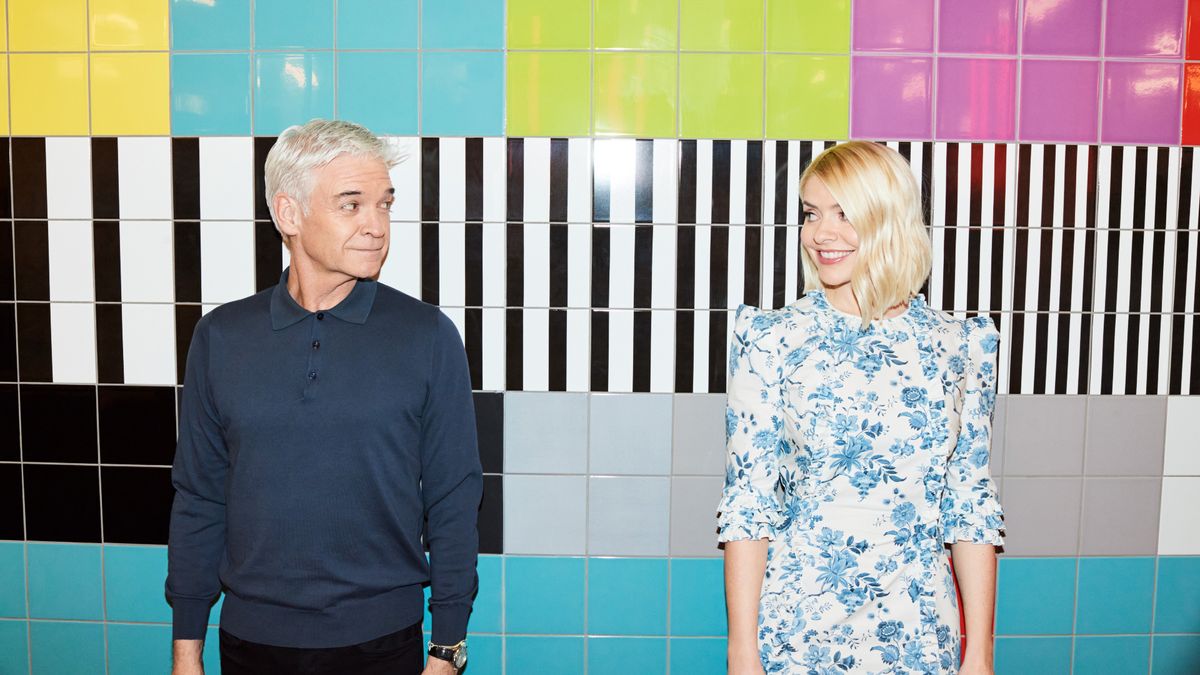 This Morning presenters Phillip Schofield and Holly Willoughby together against a multicoloured background