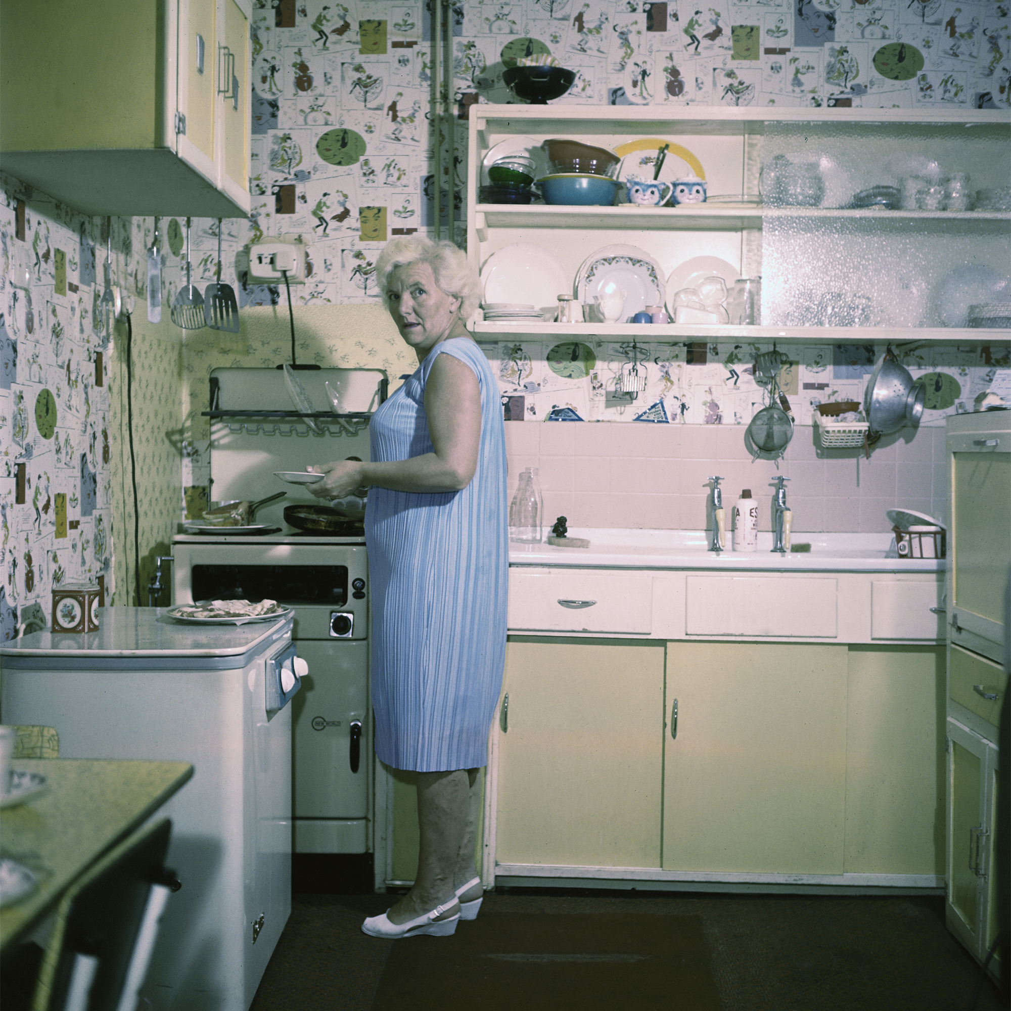 Louise. Harrison, mother of Beatle George Harrison, in the kitchen of her Liverpool home in an undated photo