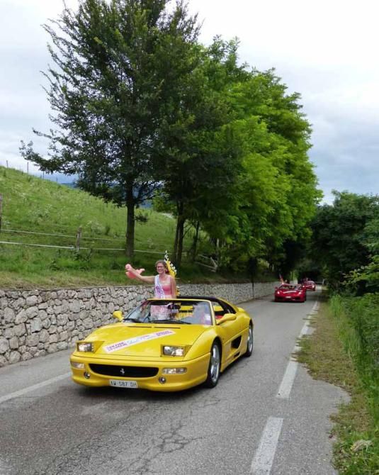 A Ferrari procession led the race up the final climb