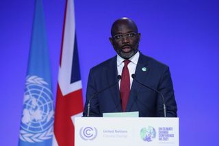 Liberia President George Weah speaks during the UN Climate Change Conference COP26 at SECC on November 1, 2021 in Glasgow, United Kingdom. World Leaders attending COP26 are under pressure to agree measures to deliver on emission reduction targets that will lead the world to net-zero by 2050. Other goals of the summit are adapting to protect communities and natural habitats, mobilising $100billion in climate finance per year and get countries working together to meet the challenges of the climate crisis. (Photo by Yves Herman - WPA Pool/Getty Images)