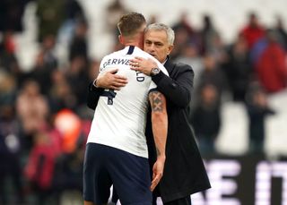 Jose Mourinho, right, embraces Toby Alderweireld after the win over West Ham