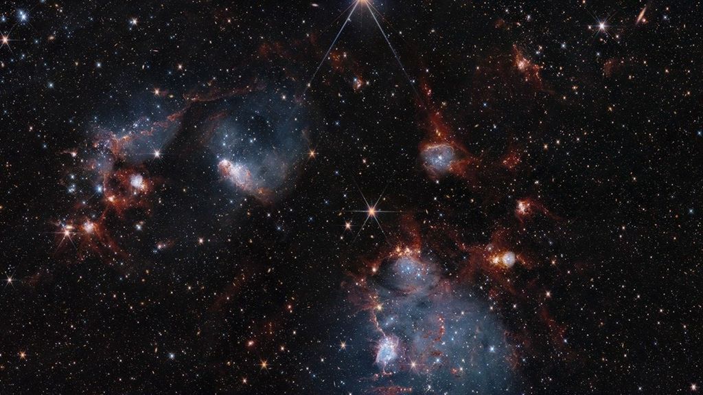 Hubble and James Webb Space Telescopes show two sides of star cluster ...
