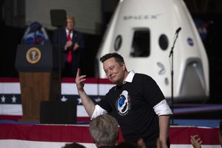 SpaceX founder and CEO Elon Musk celebrates the successful launch of the SpaceX Crew Dragon Demo-2 mission at NASA's Kennedy Space Center in Florida, on May 30, 2020.