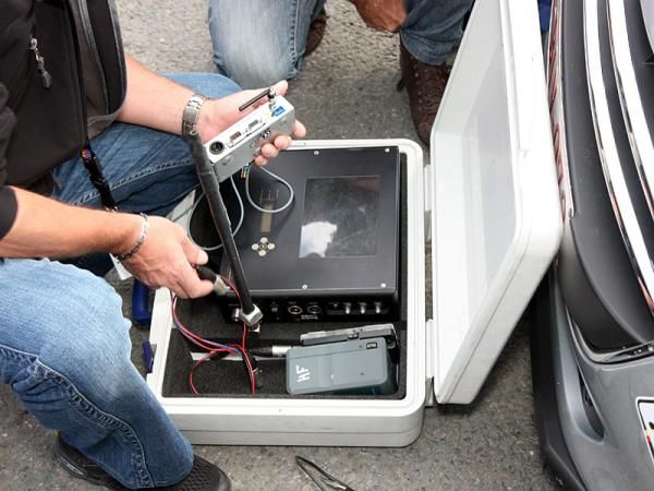 Vacansoleil-DCM preps its radio system before a stage in this year's Tour de France.