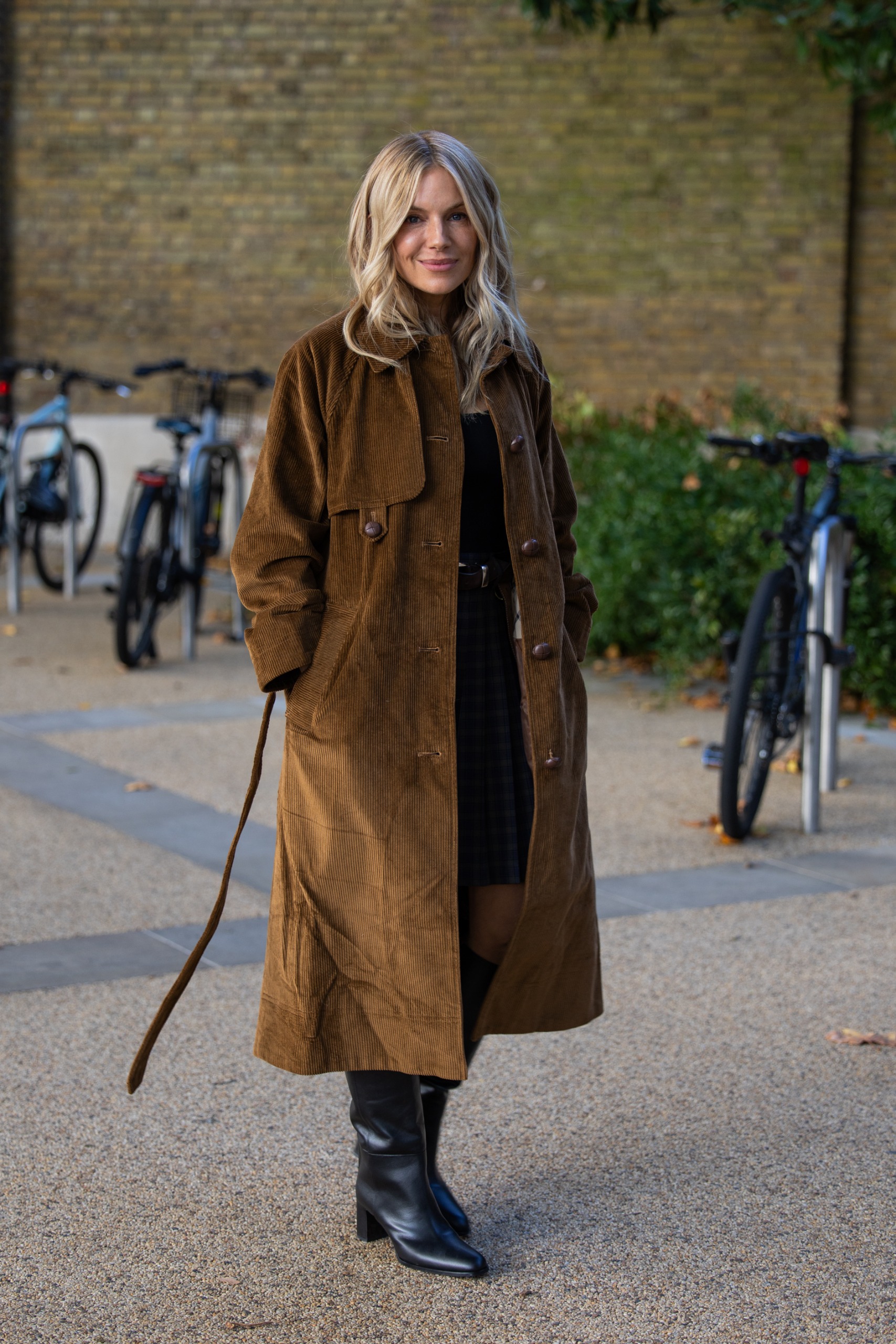 Sienna Miller wearing Barbour trench coat at London Fashion Week on 17 September, 2026