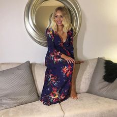 katie piper’s house with golden mirror and comfy sofa