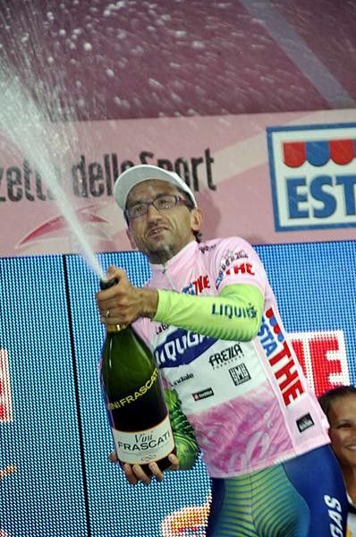 Andrea No&egrave; (Liquigas) lets the bubbly flow after sliding home in stage 11.