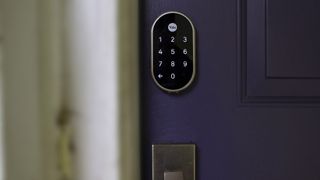 Nest X Yale lock on a purple door