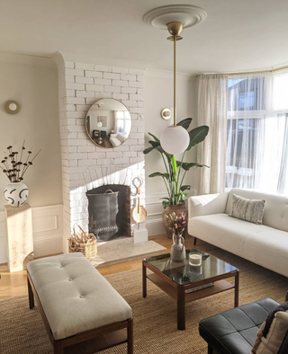 white living room with traditional wall paneling