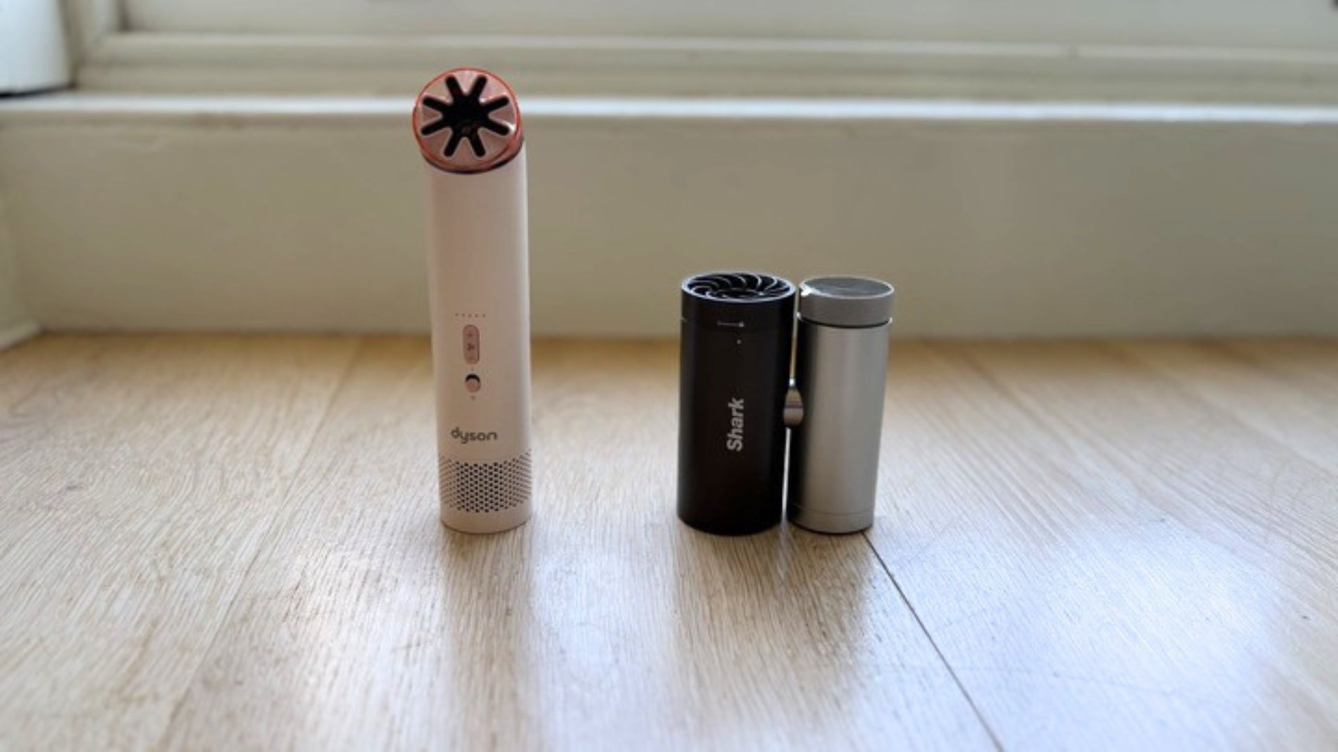 Dyson HushJet Mini Cool Fan next to the Shark ChillPill