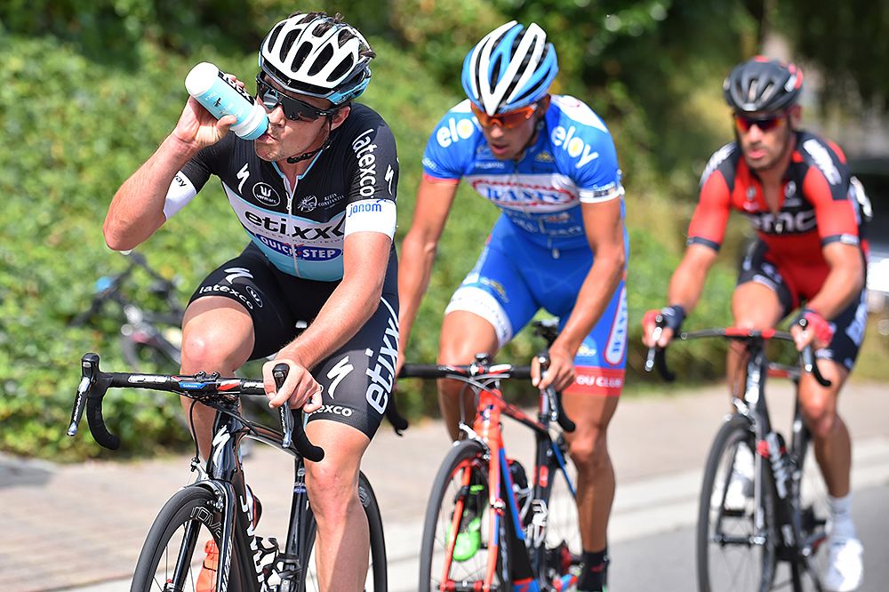 Yves Lampaert (Etixx-QuickStep) takes a drink