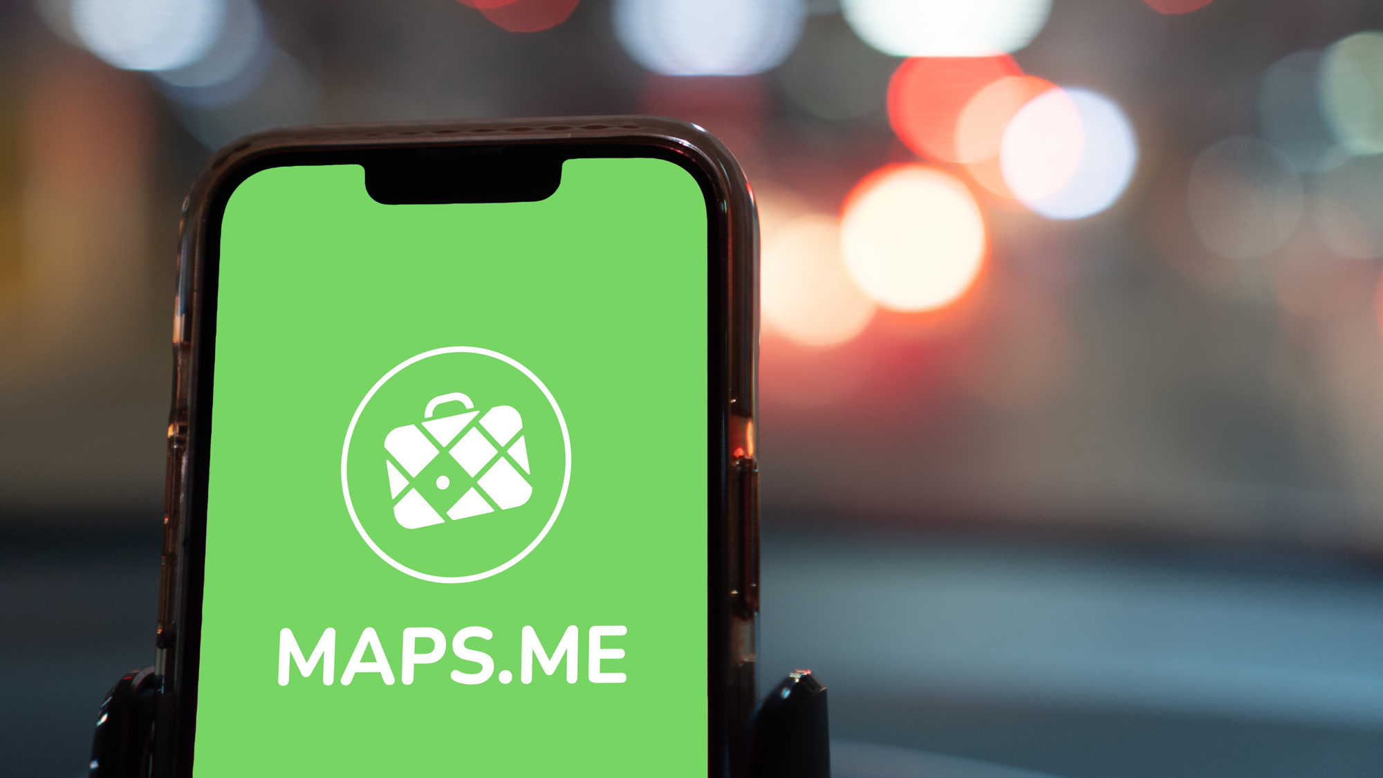 maps.me logo on a green background on an iPhone