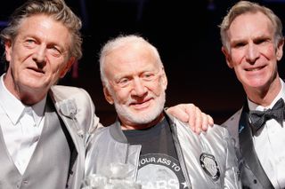 Nick Graham, Buzz Aldrin and Bill Nye pose on the runway at the Nick Graham NYFW Men's Fall/Winter 2017 fashion show on Jan. 31 in New York City.