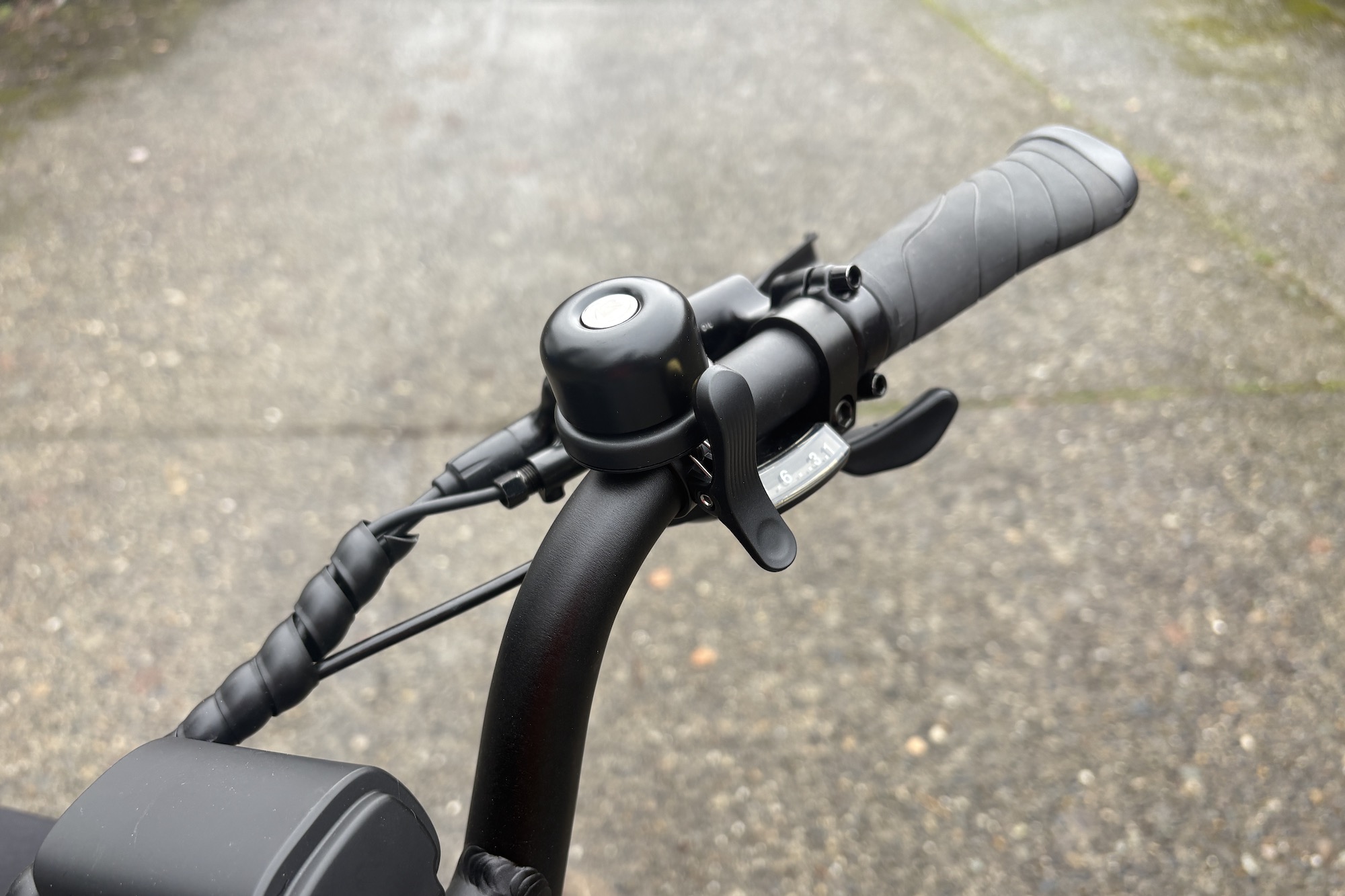RockBros Hidden AirTag Bike Bell, mounted to a handlebar