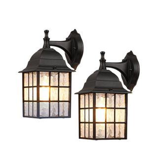 Two black wall lanterns with grid designs on the glass, domed tops, and circular bases