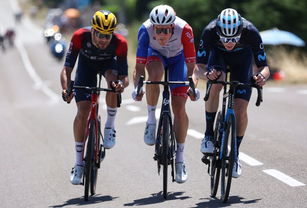 Ineos Grenadiers teams Italian rider Filippo Ganna Lm GroupamaFDJ teams Swiss rider Stefan Kung C and Movistar Teams American rider Matteo Jorgenson R cycle in a breakaway during the 13th stage of the 109th edition of the Tour de France cycling race 1926 km between Le Bourg dOisans in the French Alps and SaintEtienne in central France on July 15 2022 Photo by Thomas SAMSON AFP Photo by THOMAS SAMSONAFP via Getty Images
