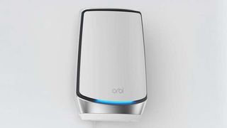 Orbi RBK863S router on wall