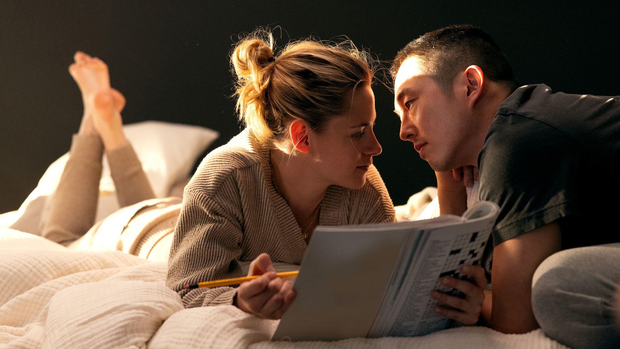 (From L to R) Kristen Stewart as Me and Steven Yeun as Iam in Love Me