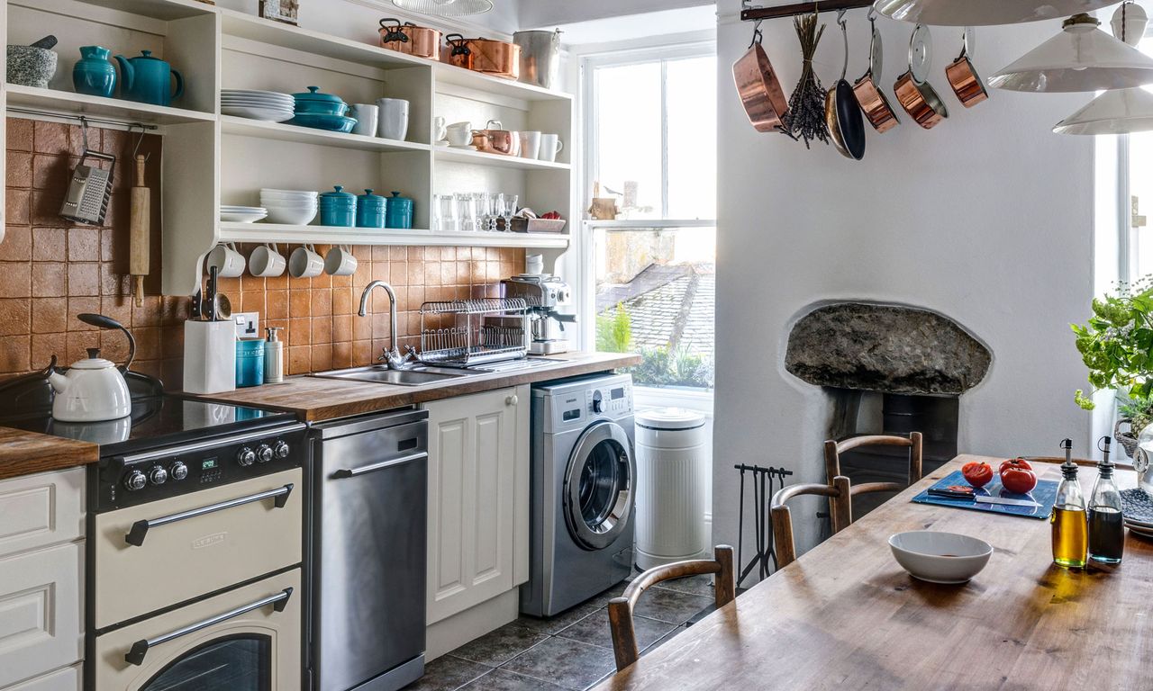 kitchen with open shelves and white wall 