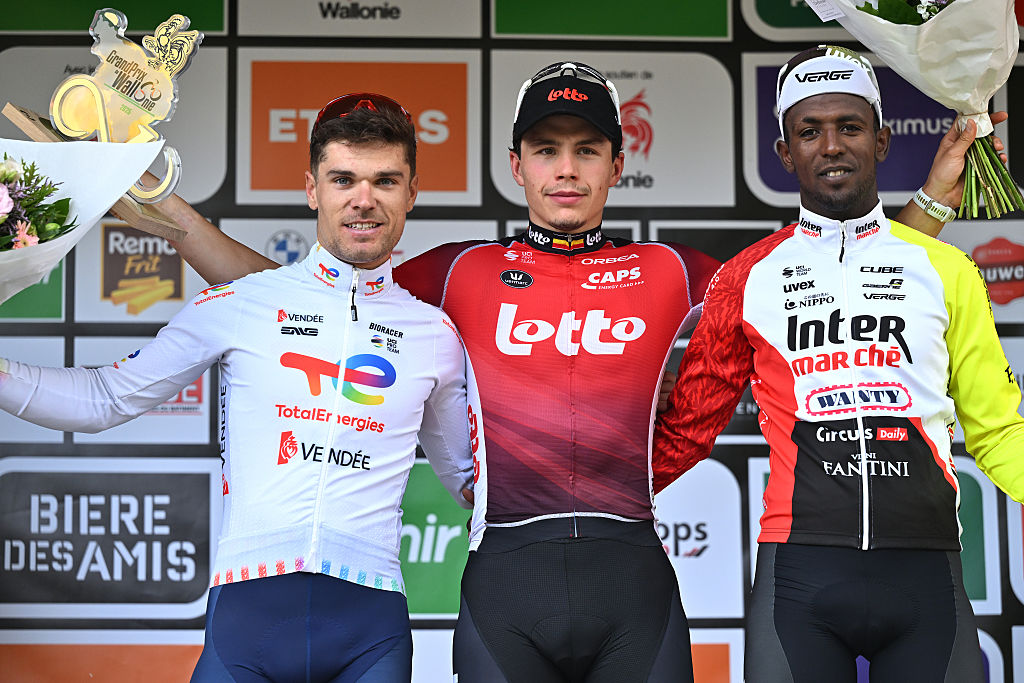 NAMUR, BELGIUM - SEPTEMBER 17: (L-R) Emilien Jeanniere of France and Team TotalEnergies on second place, race winner Arnaud De Lie of Belgium and Team Lotto and Biniam Girmay of Eritrea and Team Intermarche - Wanty on third place pose on the podium ceremony after the 65th Grand Prix de Wallonie 2025 a 187.1km one day race from Dison to Namur on September 17, 2025 in Namur, Belgium. (Photo by Luc Claessen/Getty Images)