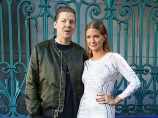 Professor Green and Millie Mackintosh poses for photographers before the Julien Macdonald Spring/Summer 2016 London Fashion Week show at Smithfield Market, London.