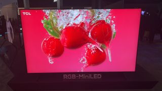 A TV with radishes on screen labelled RBG Mini-LED