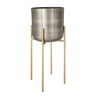 A mixed metal planter pedestal from John Lewis